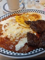 Chilaquiles Rojos Con Arrachera Red Chilaquiles with Flank Steak